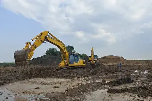 Images Dated 5th June 2024: Excavator Print, Standing in Mud