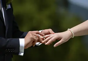 Daytime Wedding Celebration Prints: Exchanging wedding ring