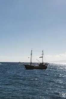 Blue Atlantic Ocean View Prints: Excursion boat with a pirate flag
