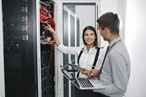Blockchain Technology Prints: IT expert checking supercomputer server