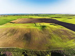 Top Down View Of British Countryside Prints: Farm and Fields over Bempton Cliffs from a drone
