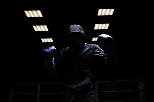 Young Sportsman Prints: Fighter without a face is standing with his hands up