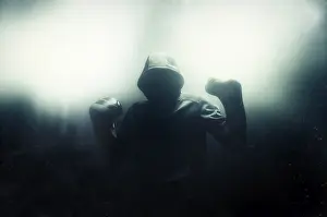 Boxing Concept Image Prints: Fighter without a face is standing with his hands up