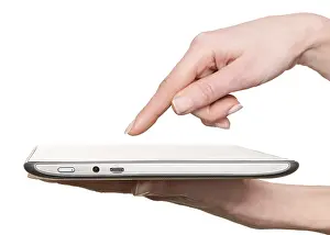 Woman Using Tablet Prints: Finger pointing at a tablet computer screen