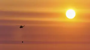 Travel Photography Crete Greece Prints: Firefighting helicopter in sunset