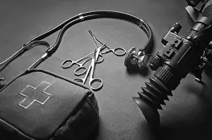 Medical Equipment Prints: First aid kit, a phonendoscope and a set of scissors