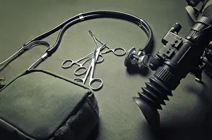 Medical Equipment Prints: First aid kit, a phonendoscope and a set of scissors
