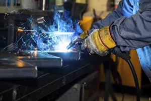 Industrial Construction Site Prints: Fitters during welding work