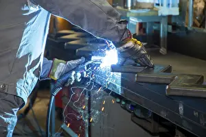 Protective Clothing For Workers Prints: Fitters during welding work