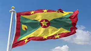 Prints of The flag of Grenada, Caribbean, flutters in the wind, isolated, against the blue sky Related Prints: The Flag of Grenada Print - Caribbean Island Scene