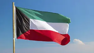 Asian National Flags Prints: The flag of Kuwait flutters in the wind