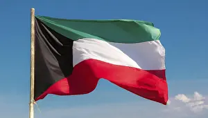 Asian Flags Prints: The flag of Kuwait flutters in the wind