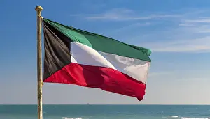 Asian National Flags Prints: The flag of Kuwait flutters in the wind