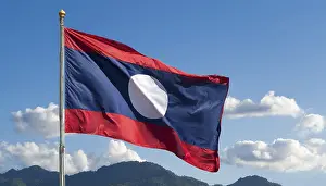 Laos Flag Prints: The flag of Laos flutters in the wind