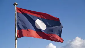Flag Fluttering In Wind Prints: The flag of Laos flutters in the wind