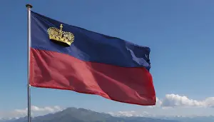 Prints of The flag of Liechtenstein flutters in the wind Liechtenstein Prints: The Flag of Liechtenstein Print