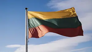 Blue Sky National Emblem Prints: The flag of Lithuania flutters in the wind