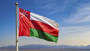 Asian National Flags Prints: The flag of Oman flutters in the wind