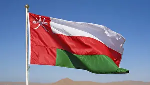 Asian National Flags Prints: The flag of Oman flutters in the wind