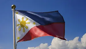 Blue Sky National Emblem Prints: The flag of the Philippines, fluttering in the wind
