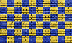 British Nationality Symbol Prints: Flag of Surrey painted on brick wall