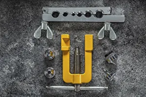 Images Dated 9th January 2024: Flaring Tools Print on Dark Background