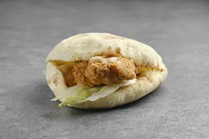 Iceberg Lettuce Prints: Flat bread with chicken fillet in breading