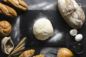 Black Background Food Photography Prints: Flat lay dough bread black background