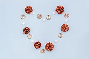Wooden Snowflake Ornaments Prints: Flat lay heart shaped out pine cones