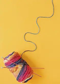 Warm Winter Scene Prints: Flat lay knitting needles wool