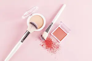 Beauty Tools Prints: A flat lay of makeup essentials featuring a compact blush with two makeup brushes