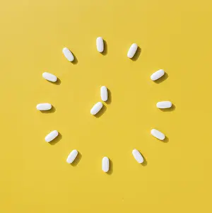 Healthcare System Products Prints: Flat lay pills making clock shape
