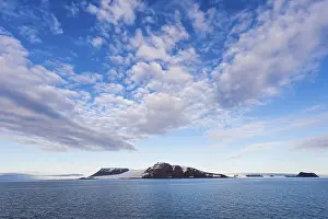 Uninhabited Island Group Prints: Flat table mountains covered with ice