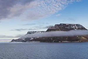 Uninhabited Island Group Prints: Flat table mountains covered with ice