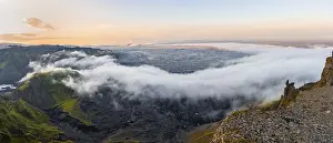 Evening Light On Rocky Cliffs Prints: Fog between the cliffs, clouds moving around