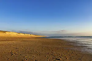 Empty Atlantic Coastline Prints: Many footprints on empty beach