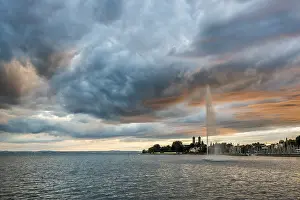Atmospheric Light In Nature Prints: Fountain and thunderclouds at sunset