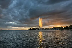 Lake Constance Sunset Prints: Fountain and thunderclouds at sunset
