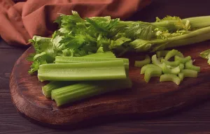Dark Background Vegetables Prints: Fresh bunch of celery, top view