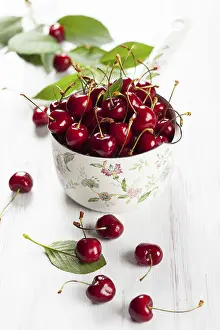 Fresh Cherries Prints: Fresh cherries in pot on the table