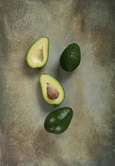 Avocado Fruit Prints: Fresh sliced avocado on the table