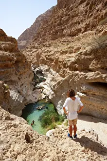 Rugged Cliff Scenery Prints: Freshwater pool between rugged cliffs
