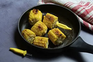 Corn On The Cob Prints: Fried corn on the corn cob in pan