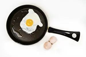 Still Life Images Prints: Fried eggs in a pan
