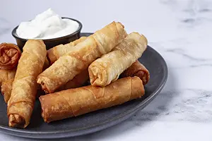 Wooden Board Presentation Prints: Fried spring rolls with cheese