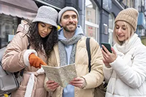 Tourist Attraction Prints: Friends looking map