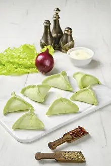 Frozen Dumplings Prints: Frozen dumplings with spinach