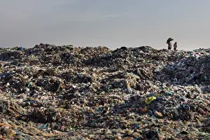 Waste Management Issues Prints: Garbage collector at garbage dump