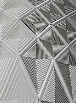 Contemporary Architectural Style Prints: Geometric white patterns and cladding on wall of a modern building