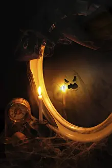 Abandoned Table Setting Prints: Ghost reflection in the mirror on the table with a candle